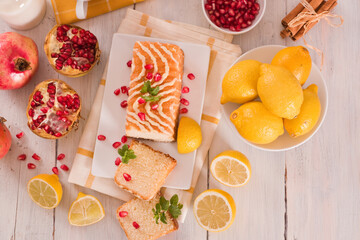 Lemon sponge cake with pomegranate. 