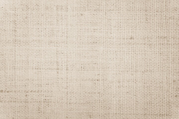 Fototapeta na wymiar Brown Hemp rope texture background. Sackcloth or blanket wale linen wallpaper. Rustic sack canvas fabric texture in natural. Haircloth vintage linen burlap weaving, Old beige carpet background.