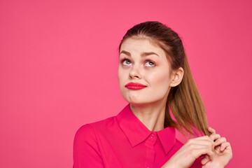 attractive girl in pink shirt cropped view bright makeup red lips gesturing with hands Copy Space