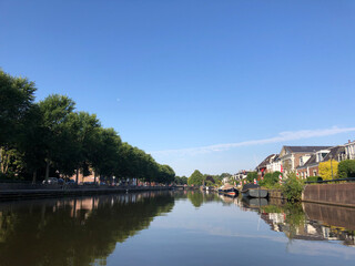 Fototapeta na wymiar Canal around the old town of Sneek
