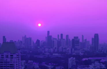 Fototapeta na wymiar Pop art surreal style vivid purple colored sunset sky over the metropolis