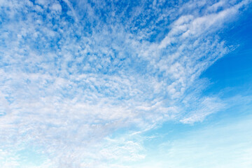 Naklejka na ściany i meble Abstract texture of clouds on blue sky