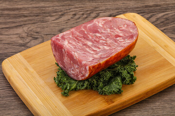 Beef ham piece over board