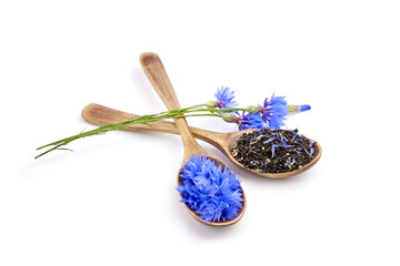 Obraz na płótnie Canvas Spoons with herbal tea blend with fresh cornflower petals isolated on white