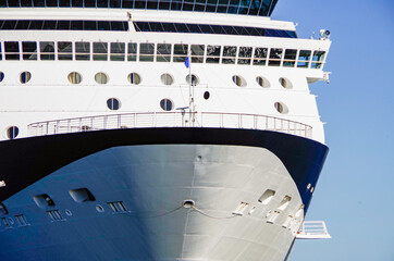 Modern luxury cruiseship or cruise ship liner anchoring on blue sea in bay offshore of Bar Harbor,...