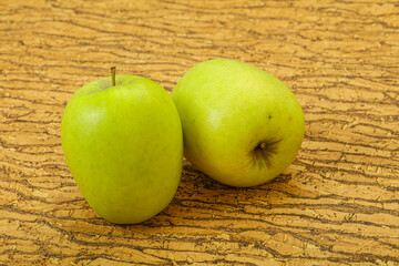 Two ripe green sweet apples