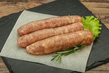 Raw pork meat sausages for grill