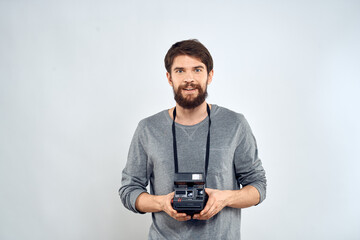 Male photographer professional camera work Studio Technology modern art light background