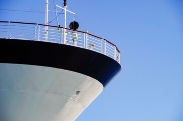 Modern luxury cruiseship or cruise ship liner anchoring on blue sea in bay offshore of Bar Harbor,...