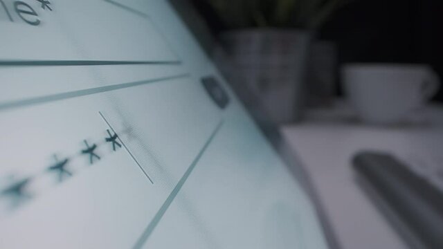 Motorized moving shot of entering password at login page, shot with macro probe lens