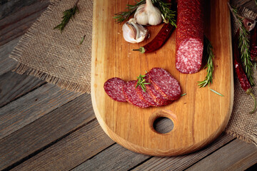 Salami on a cutting board.