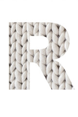 Letter " R " is a knitted of the alphabet isolated on a white background. Illustration of a collection of alphabet numbers of knitted pigtails background for a design project, poster, postcard