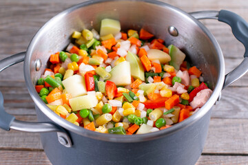 Mix of vegetables, cooked in saucepan