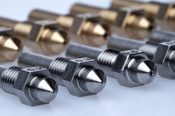 Set of 3D printer nozzles in different sizes on a white background. High quality photo