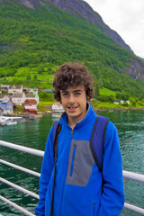 Portrait of happy boy in Norway fyords