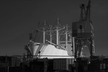 Old ship and crane at night