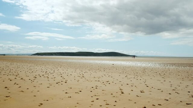 Tracking shot of the beautiful seafront of Weston-super-Mare, a popular a seaside town in Somerset, England, UK