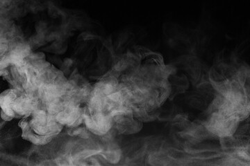 Blur white water vapour on isolated black background. Abstract of steam with copy space. Steam flow. Smoke on white background.