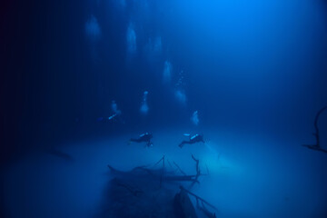 diving in the cenotes, mexico, dangerous caves diving on the yucatan, dark cavern landscape underwater