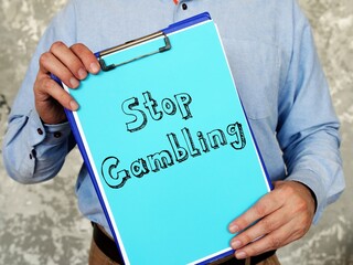 Financial concept about Stop Gambling with phrase on the page.