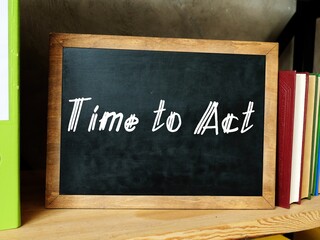 Business concept about Time To Act with sign on the sheet.