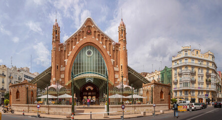 Naklejka premium Valencia, Spain: East facade of Mercado de Colon, a former covered market of the Valencian Modernista school ; nowadys a food and shopping centre.