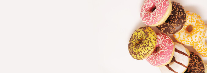 Delicious donuts on white color background.