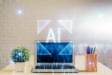 Double exposure of table with computer on background and data theme hologram. Data technology concept.