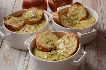 French Onion Soup with toasted bread and cheddar cheese