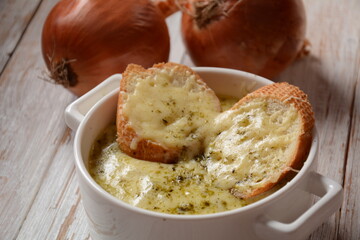 French Onion Soup with toasted bread and cheddar cheese
