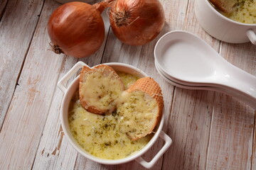 French Onion Soup with toasted bread and cheddar cheese