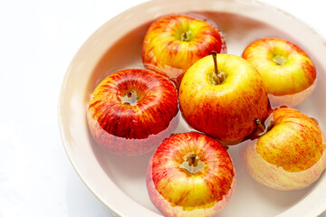 Washing fresh apples in the water