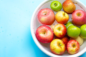 Washing fresh apples in the water