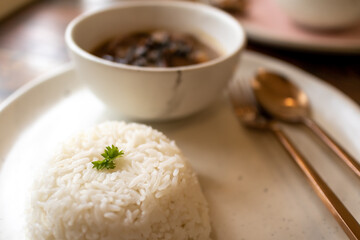 Beef stew with spices set is served on a classic wooden table.