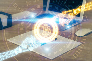 Double exposure of blockchain theme hologram and table with computer background. Concept of bitcoin crypto currency.