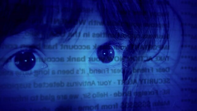 Face and eyes of a little girl looking at a computer screen, with a scrolling wall of spam mail filling it.
