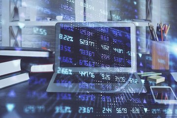 Double exposure of forex chart and work space with computer. Concept of international online trading.