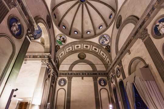 FLORENCE, ITALY - NOVEMBER 6, 2016: interior of Pazzi chapel in Basilica di Santa Croce (Basilica of the Holy Cross) in Florence. The chapel was commissioned to Brunelleschi by Andrea de Pazzi in 1429