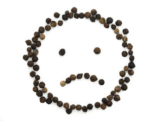 Black pepper emoticon sad. Isolated tasty, background herb, spice,  peppercorn emoticons for social media banner.
