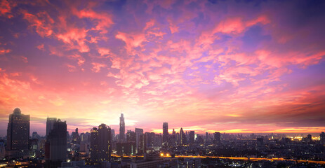 Naklejka na ściany i meble Skyscraper day concept: Bangkok city and sky sunset background