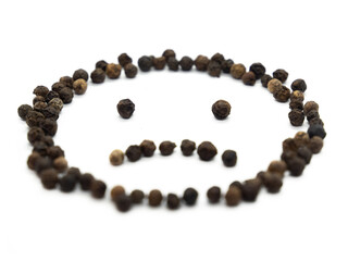 Black pepper emoticon sad. Isolated tasty, background herb, spice,  peppercorn emoticons for social media banner.