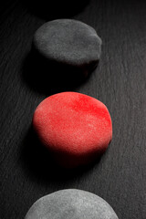 National Chinese dessert, colored mochi on the dark slate stone background