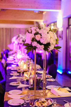 Beautifully decorated wedding table and other details at wedding hall. Wedding day.