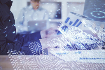 High tech city drawing with businessman working on computer on background. Smartcity concept. Double exposure.