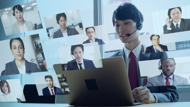ビデオ会議で話す男性会社員　テレビ電話　テレワーク　リモートワーク