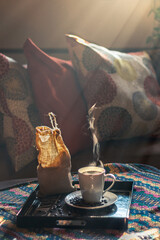 a cup of coffee with beans Smoking