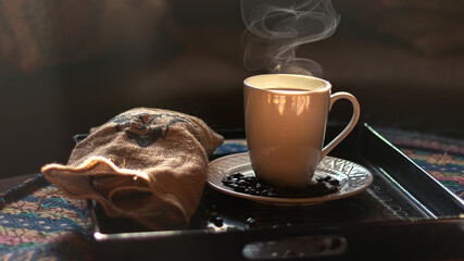 a cup of coffee with beans Smoking