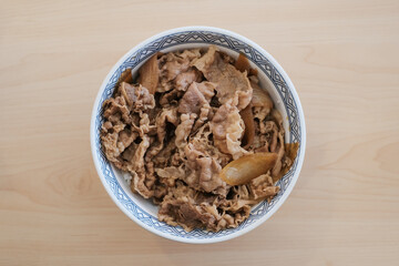 Thinly sliced beef that served in oriental bowl