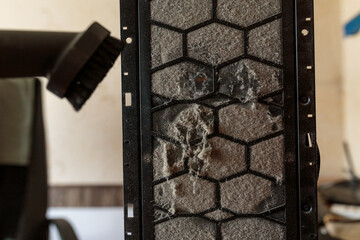 cleaning the computer from dust. the bullet filter is completely clogged with dust.