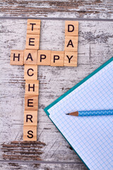 Letter cubes is making up happy teacher's day. Happy teacher's day concept.
